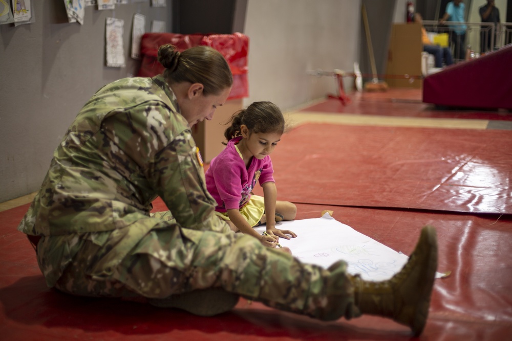 Children receive medical care, play with service members at IRT Puerto Rico 2019