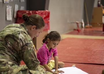 Children receive medical care, play with service members at IRT Puerto Rico 2019