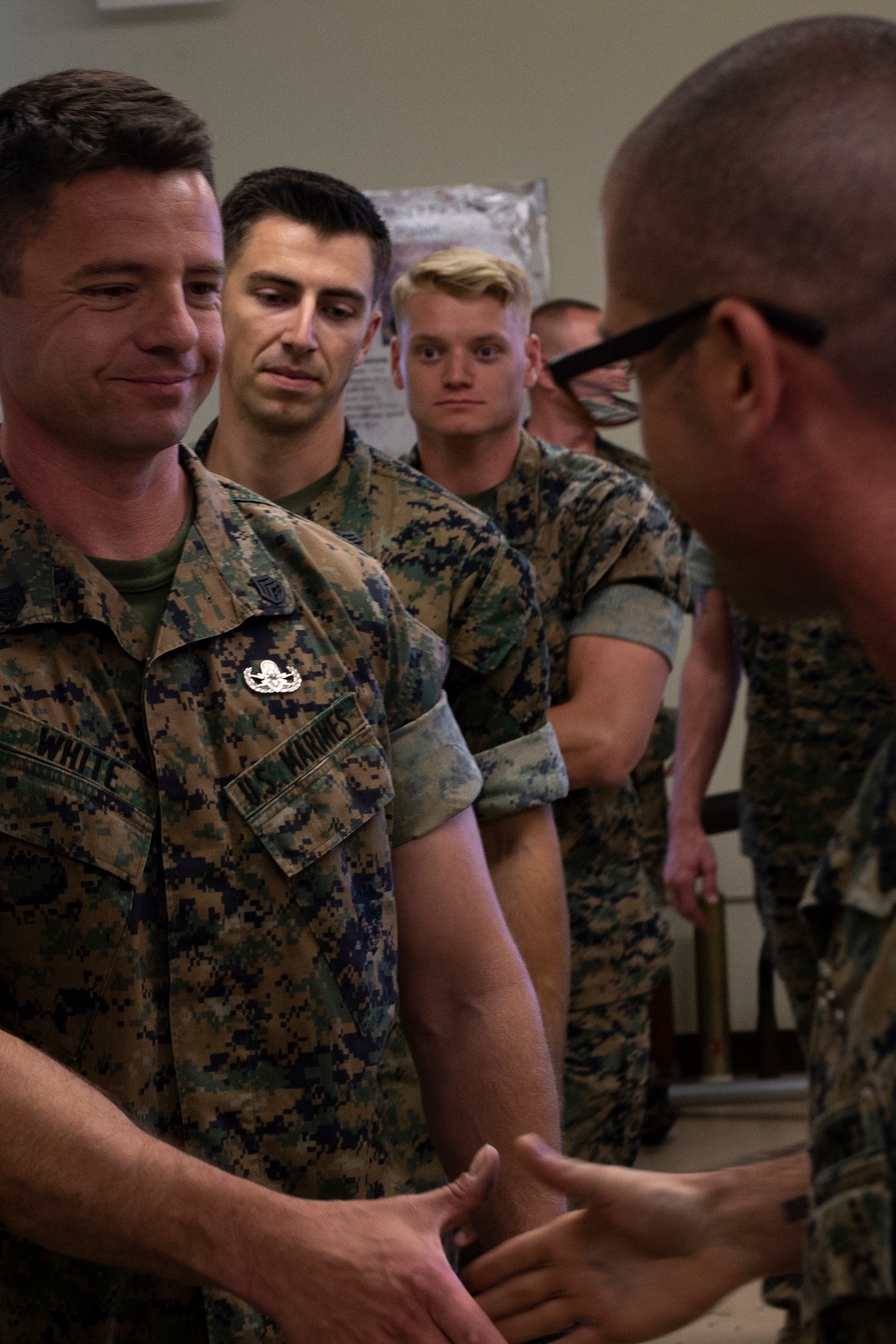 Gunnery Sgt. Michael Lesterick receives the Master EOD Breast Insignia