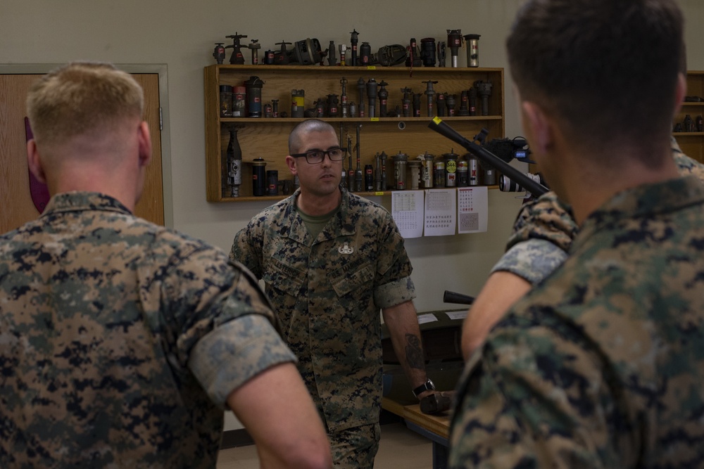 Gunnery Sgt. Michael Lesterick receives the Master EOD Breast Insignia