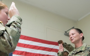 Daughter Reads The Oath Of Reenlistment To Her Mother