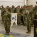 543rd cases their colors in preparation for their deployment in support of Operation Atlantic Resolve