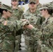 543rd Composite Supply Company cases their colors in preparation for a deployment in support of Operation Atlantic Resolve