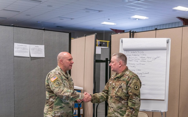 Kansas TAG awards coin to Cyber Shield 19 participant