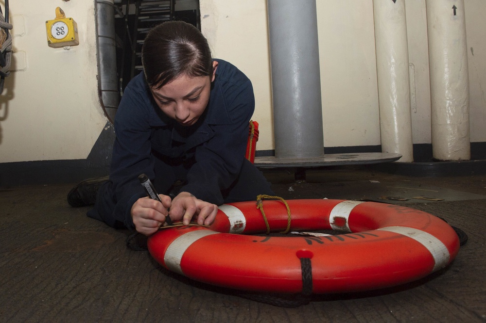 U.S. Sailor stencils life ring