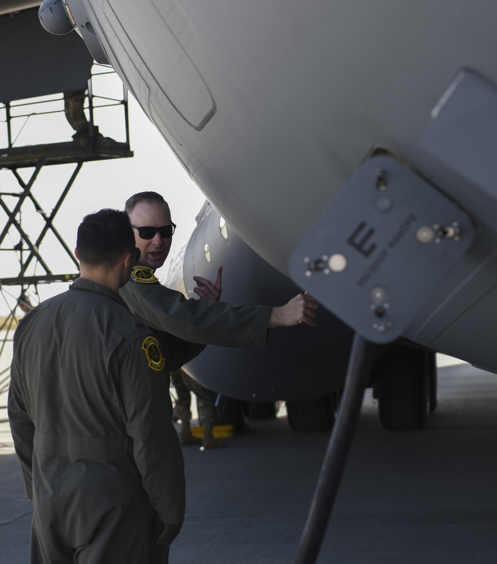 21st AS mentor high school students at Aviation Day