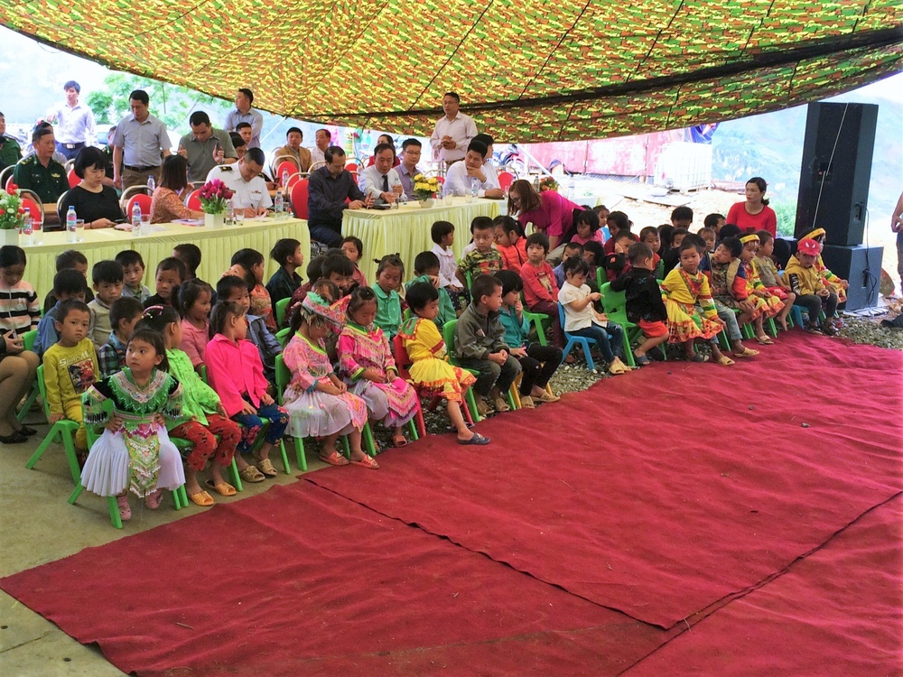 Kindergarten kids await the grand opening of U.S. constructed kindergarten in Vietnam