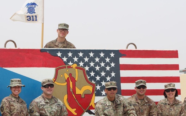 311th QM CO T-Wall