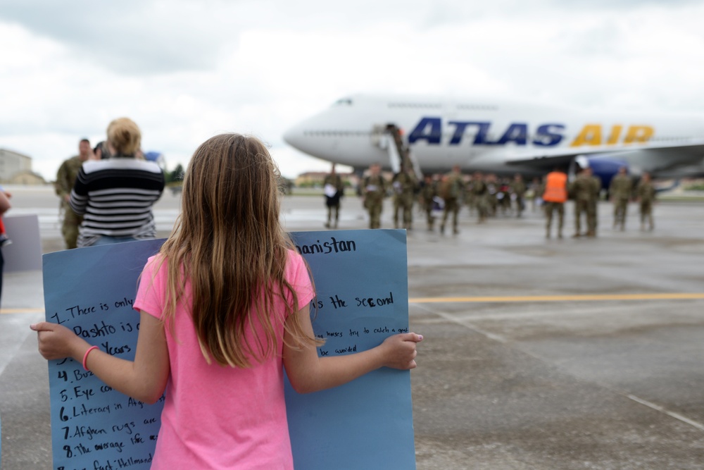 Buzzard team returns home