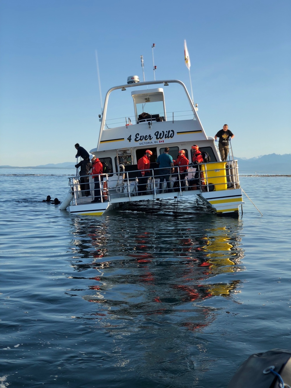Coast Guard members monitor salvage of tour vessel off Smith Island, Wash.