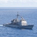 The guided-missile cruiser USS Mobile Bay (CG 53) cuts through the Atlantic Ocean