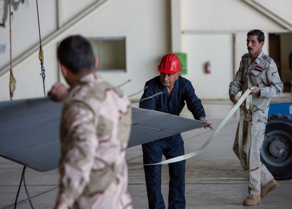 Iraqi Air Force maintainers perform C2 checks