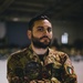 An Italian paratrooper waits for airborne operations