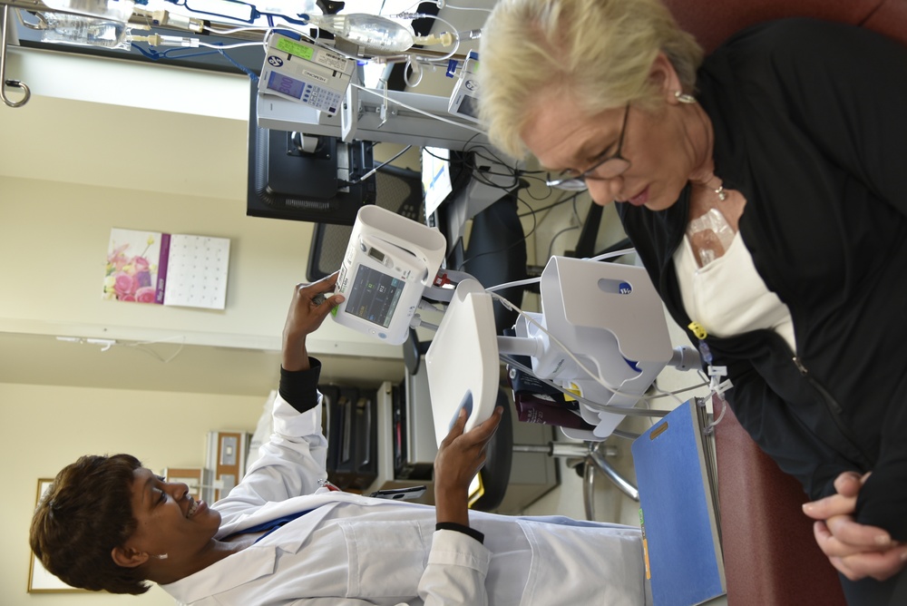 An infusion nurse attends to a WRB beneficiary