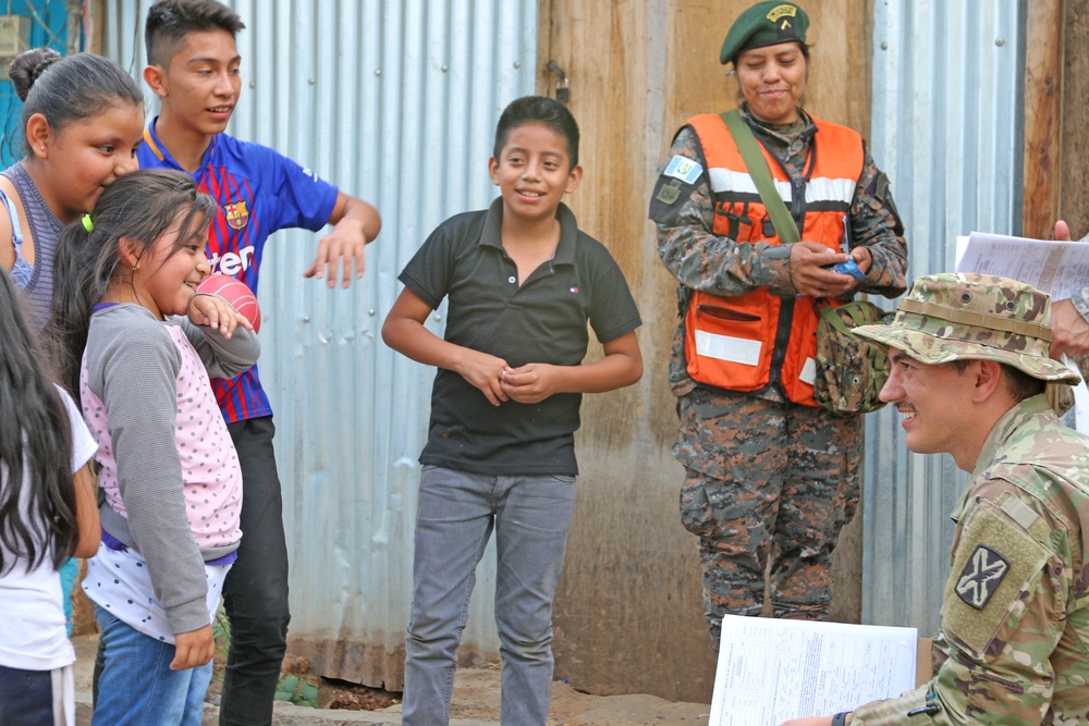 U.S. Army Soldiers interact with San Sebastian community residents in Huehuetenango, Guatemala, in support of exercise Beyond the Horizon 2019