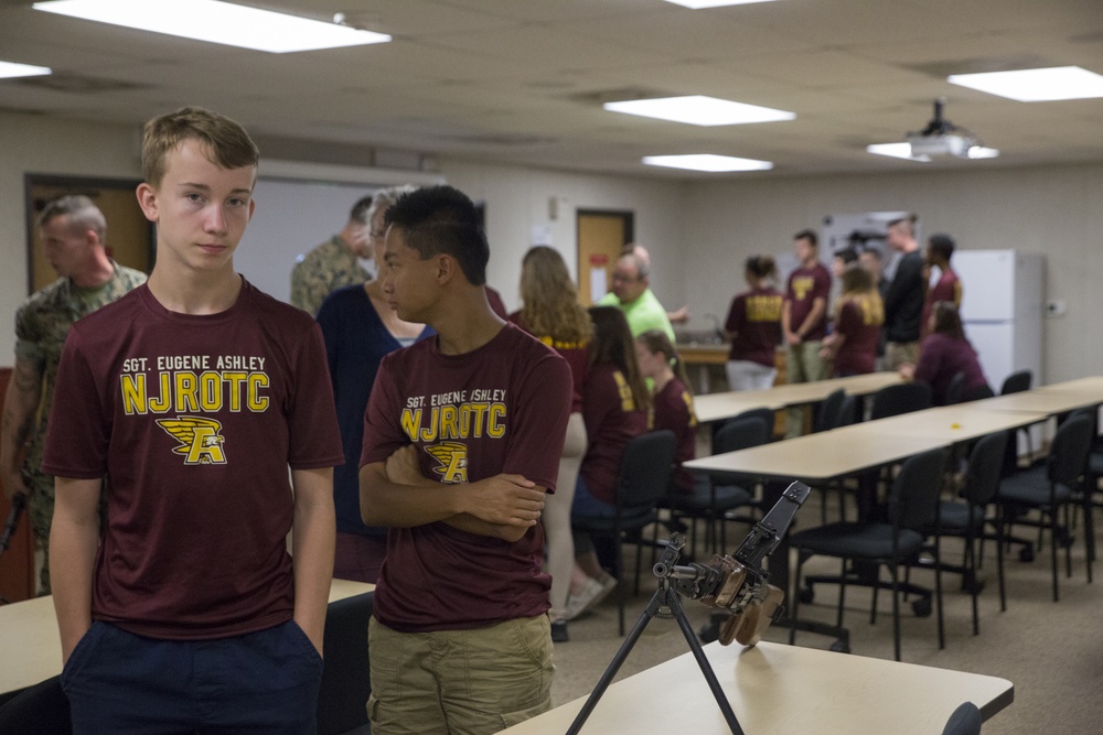 Marine Corps Security Cooperation Group Welcomes Eugene Ashley High School NJROTC students