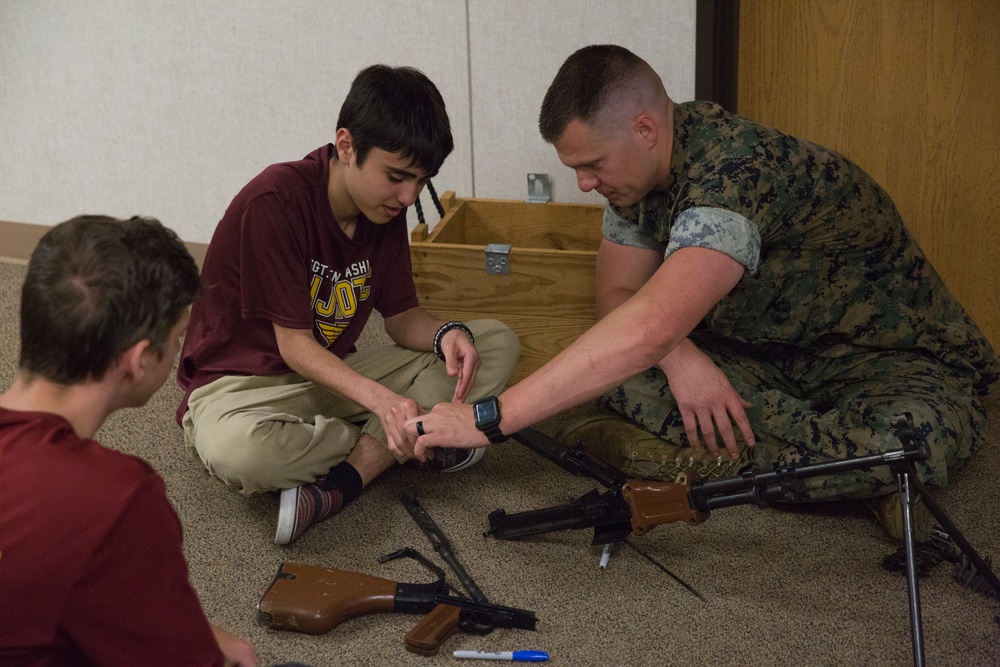 Marine Corps Security Cooperation Group Welcomes Eugene Ashley High School NJROTC students