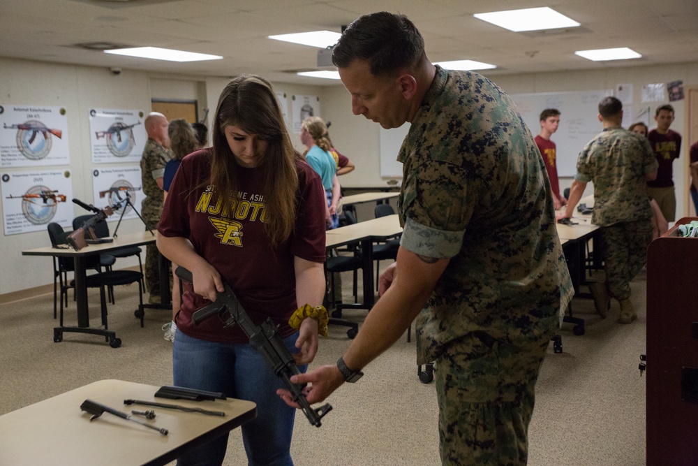 Marine Corps Security Cooperation Group Welcomes Eugene Ashley High School NJROTC students