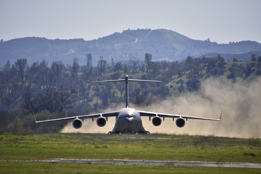 C-17 Takes Off from Dirt Airstrip