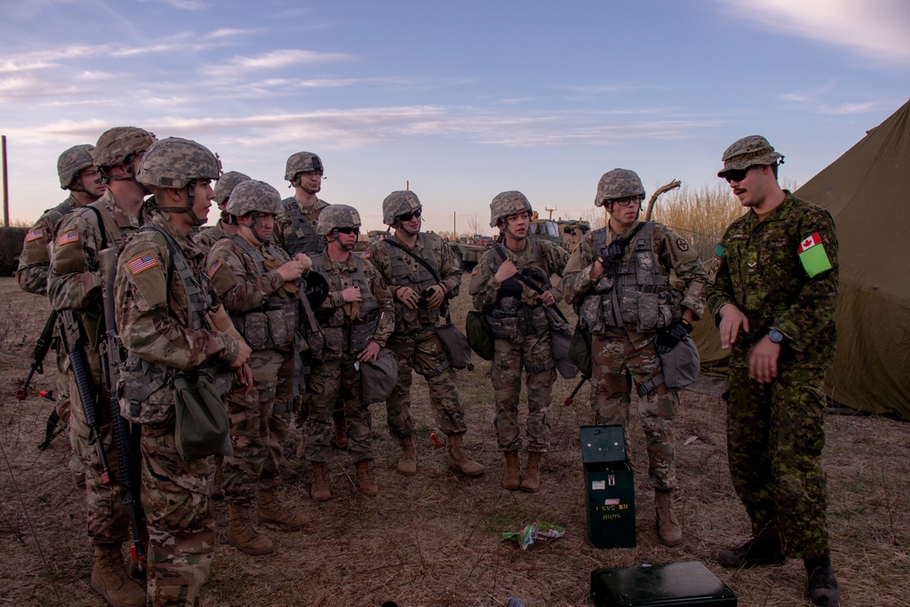 Canadian Private Devries Trains U.S. Soldiers