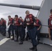 Sailors aboard the Arleigh Burke-class guided-missile destroyer USS Momsen (DDG 92) conduct line handling during a replenishment-at-sea with the fleet replenishment oiler USNS Walter S. Diehl (T-AO 193).