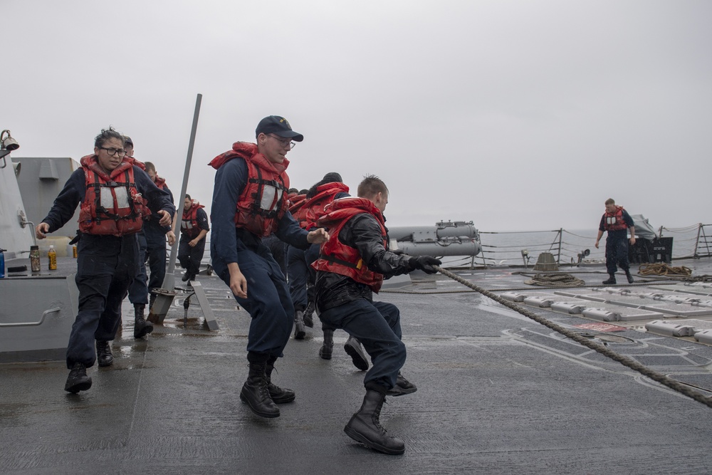 Sailors aboard the Arleigh Burke-class guided-missile destroyer USS Momsen (DDG 92) conduct line handling during replenishment-at-sea with the fleet replenishment oiler USNS Walter S. Diehl (T-AO 193).