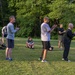 Coaches and Marines participate in a workout session during the Marine Corps Coaches workshop
