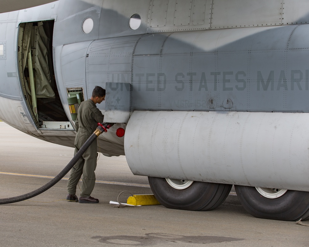 U.S. Marines KC-130J Hercules refuel an F-35B Lightning II during Exercise Northern Edge 19