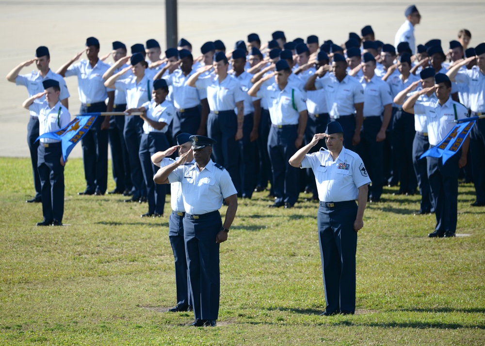 Airmen Salute During Change of Command Ceremony