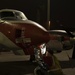 Dyncorp aircraft washer prepares a T-44C Pegasus for a routine cleaning