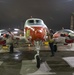 Dyncorp aircraft washer prepares a T-44C Pegasus for a routine cleaning