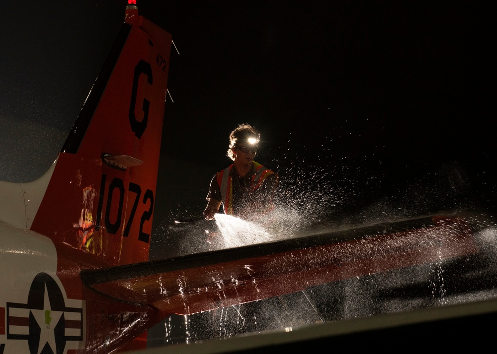 Aircraft Washer cleans a T-44C Pegasus