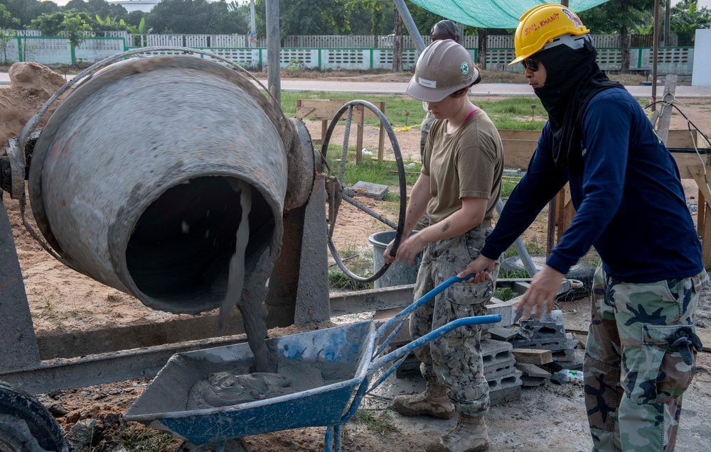 U.S. Navy Service Members; Royal Thai Armed Forces build library at Ban Surasak School during Pacific Partnership 2019