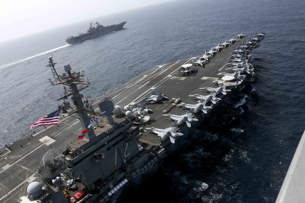 Abraham Lincoln Carrier Strike Group (CSG) 12 and Kearsarge Amphibious Ready Group (ARG) conduct combined operations.