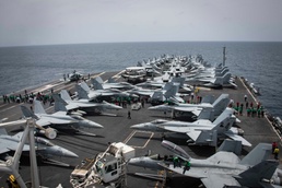 The flight deck aboard the Nimitz-class aircraft carrier USS Abraham Lincoln (CVN 72).