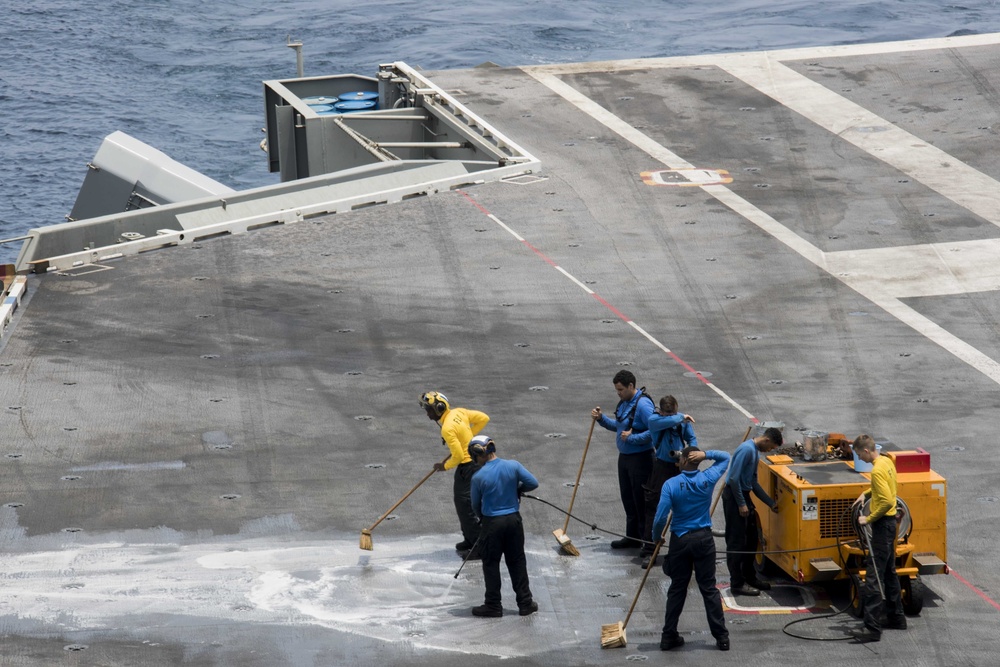 The flight deck aboard the Nimitz-class aircraft carrier USS Abraham Lincoln (CVN 72).