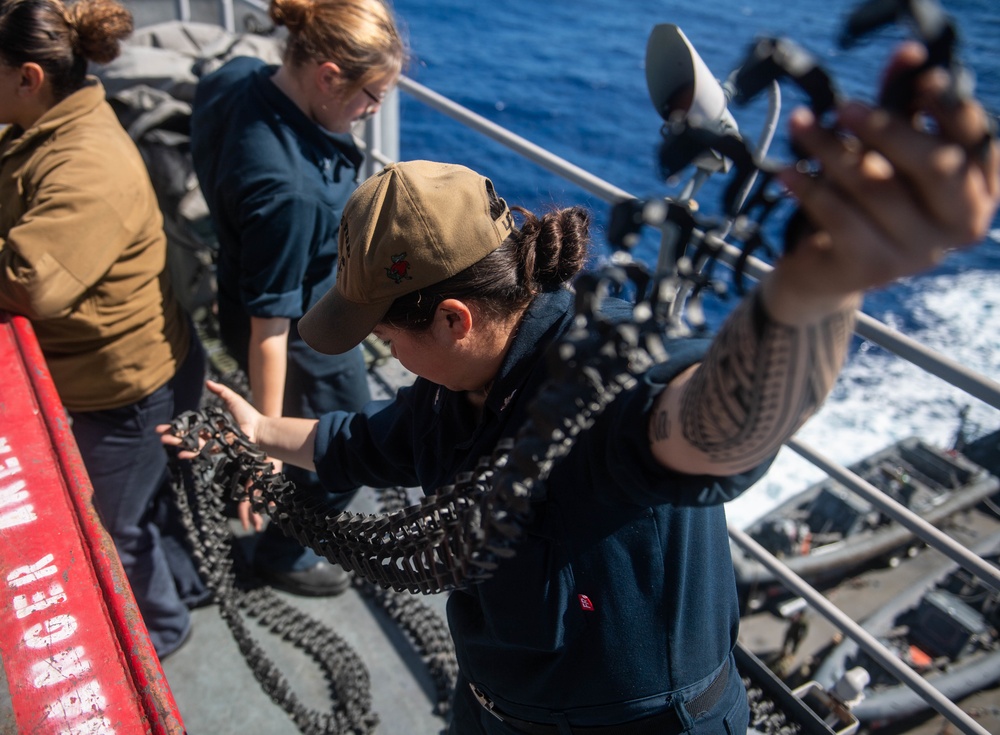 Sailors aboard USS Harpers Ferry Conduct Maintenance