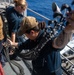 Sailors aboard USS Harpers Ferry Conduct Maintenance