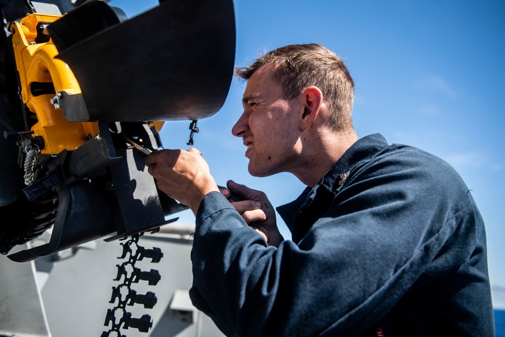 Sailors aboard USS Harpers Ferry Conduct Maintenance