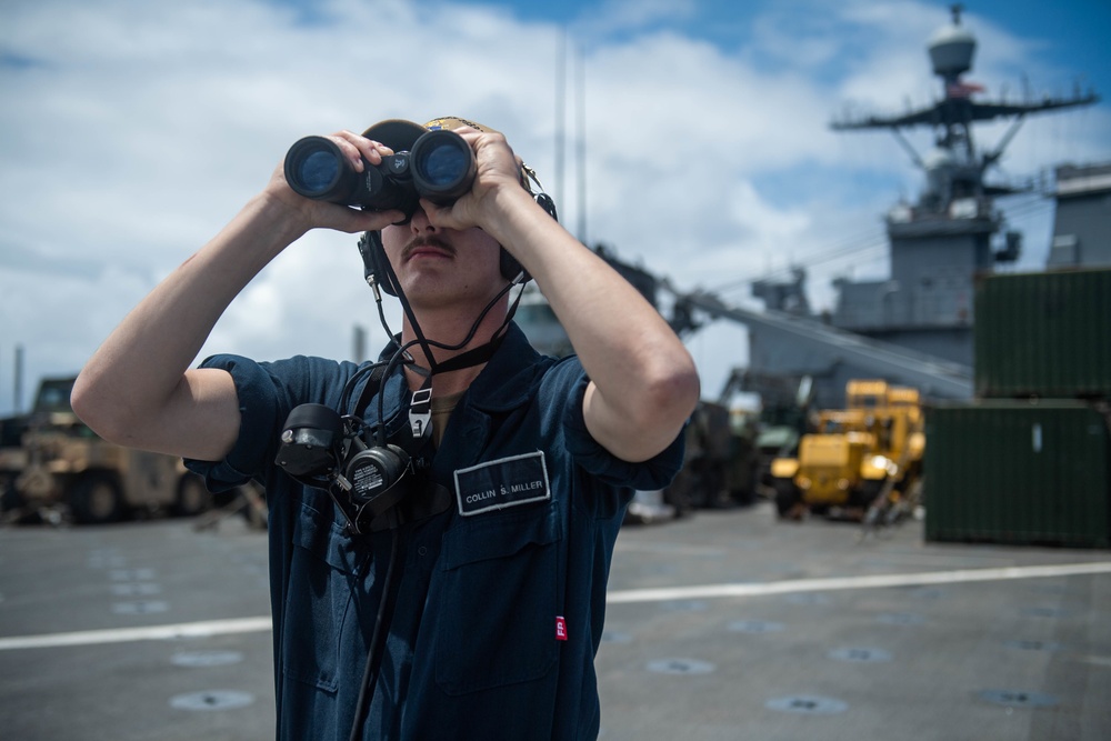 Sailor aboard USS Harpers Ferry Stands Watch