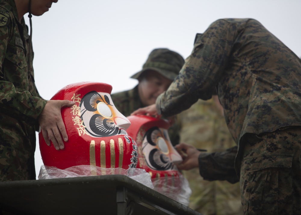 U.S. Marines participate in the opening ceremony for Southern Jackaroo