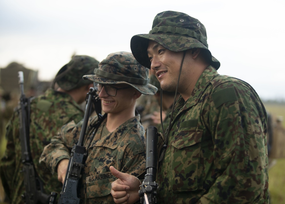 U.S. Marines participate in the opening ceremony for Southern Jackaroo