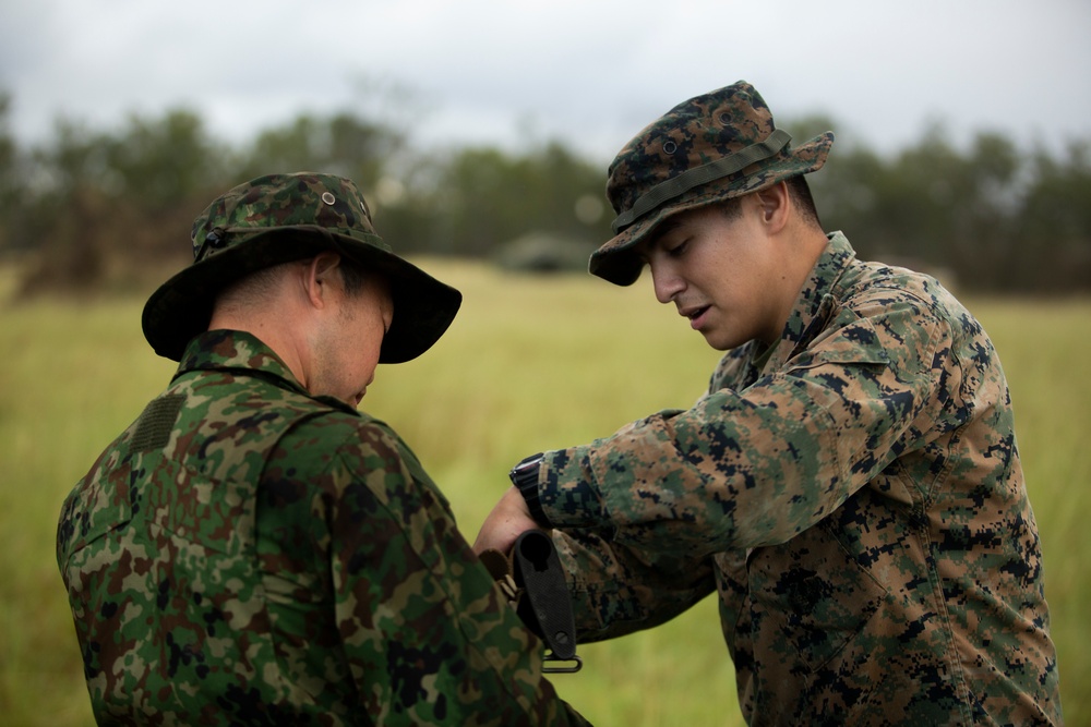 U.S. Marines participate in the opening ceremony for Southern Jackaroo