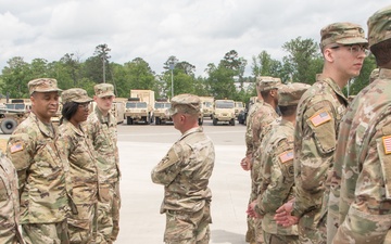 U.S. Army Reserves Command Sergeant Major Carlos O. Lopes, of the 143d Sustainment Command-Expeditionary, visits soldiers of the 518th Sustainment Brigade