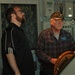 Museum volunteer on simulated bridge of USS Preble (DDG-46)