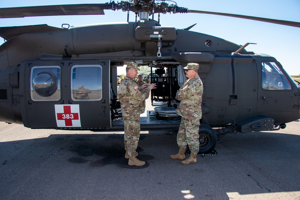 Lt. Col. Houston Shows off a Bell CH-146 Griffon to Maj. Gen. Cardwell