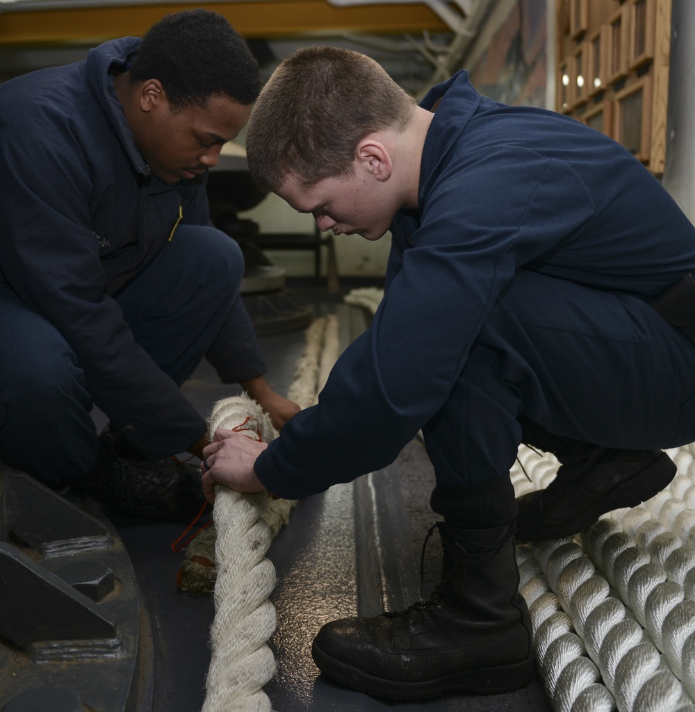 Sailors Prepare Mooring Lines