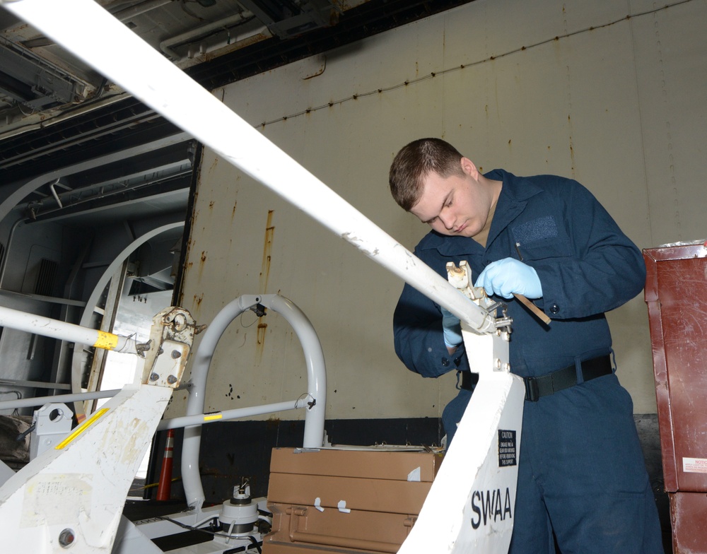 Nimitz Sailor Conducts Corrosion Control
