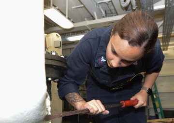 Nimitz Sailor Replaces Control Valve