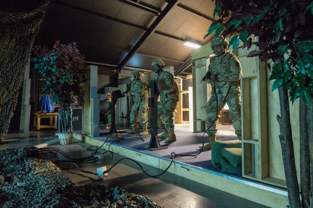 Dental Clinic Soldiers Practice Firing at the Engagement Skills Trainer